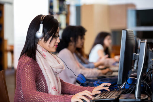 students at computers istock 502996234