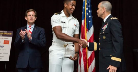military education awards handshake